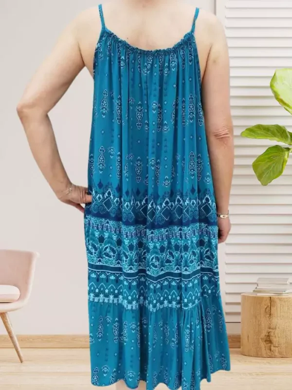 robe-a-fines-bretelles-bleu-ds Robe à fines bretelles bleu été femme – légère, fluide et confortable. Idéale pour la plage, les vacances et les journées ensoleillées. Mode estivale tendance vue dos