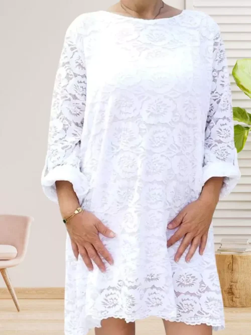 Robe dentelle motif fleurs, blanc, col rond, manches 3/4 ajustables et transparentes, corps doublé, taille unique (36-42) vue devant