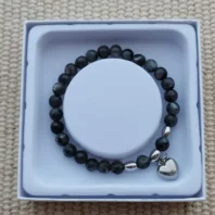 Bracelet perle et coeur noir