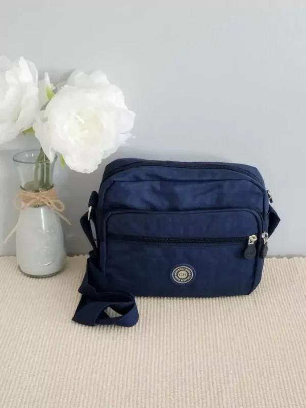 sac bandoulière charm bag 4 poches bleu foncé