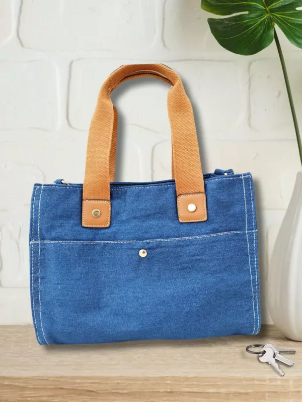 sac-a-main-en-jean-bleu-dv Sac à main en jean bleu femme vue devant